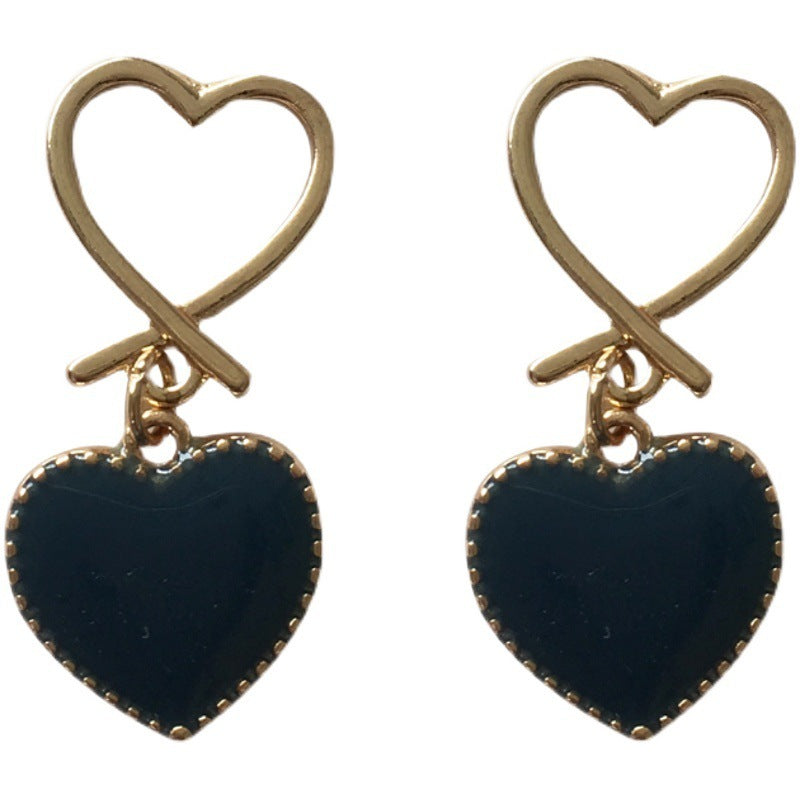 Retro Goudkleurige Hartoorbellen – Hollow Love Studs